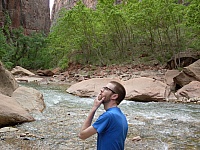 Tim standing in the middle of Zion's National Park